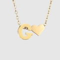 Elegant gold-plated necklace featuring a personalized letter G and heart pendant design - Letter G / Gold