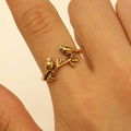 Close-up of golden bird and branch ring detail with intricate textured feathers - Twin Birds and Branches Style (7586)