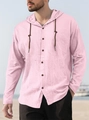 Detail of pink linen hooded shirt featuring dark drawstrings and button placket on model - Pink