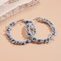 Minimalist denim hoop earrings with raw edges and silver pins on a stone background - Blue (925 Sterling Silver Earring Post)