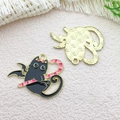 Pink and black enamel devil cat charm with golden metal finish and grid texture back - 31x24mm