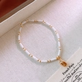 Elegant beaded bracelet with white pearls and gold tulip pendant in French style - 5# Bracelet - White - Conch