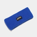 Macro shot of royal blue knitted headband showing ribbed texture and logo patch - One Size / Sapphire Blue