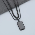 Detail of double-layer men's stainless steel necklace with black rectangular pendant - Black