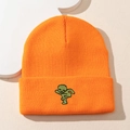 Orange knitted beanie with green cartoon alien embroidery in casual streetwear style - One Size / Orange