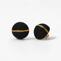 Detail of round black enamel stud earrings with gold chain link motif in macro view - Black (KDE1823)