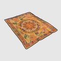Detail showing vintage bohemian sun deity pattern and floral motifs on flannel blanket - Orange Sun God Mandala