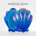 Glittery shell-shaped hairbrush in starry blue gradient finish for detangling hair - Shell Glitter / Starry Blue