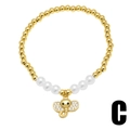 Bracciale con perle dorate, perle bianche e ciondolo a forma di elefante con zirconi - Stile Con Perline E Ciondolo Elefante (C)