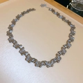 Detailed view of a silver butterfly pendant necklace resting on a beige jewelry display tray - 14# Silver Butterfly Necklace (Titanium Steel)