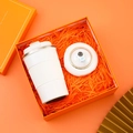Business gift set featuring a white coffee cup and astronaut accessory in an orange box - [Vitality Orange] Cup + Hand Warmer