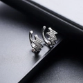Lightning bolt silver clip-on earrings with pavé white zircon stones on black texture - Silver