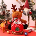 Close-up of reindeer plush Christmas gift bag with festive Merry Christmas embroidery - Deer