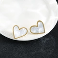 Golden heart stud earrings with white mother-of-pearl inlay on a ceramic tray - 106-Gold White Shell