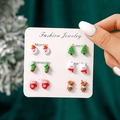 Close-up of 6 pairs of resin Christmas stud earrings featuring Santa and Reindeer designs - Santa Christmas Tree Sock Rabbit Glove Reindeer Set(SD62557)