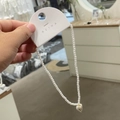 Minimalist beaded pearl necklace with white heart pendant on elegant brand display card - White Heart Pendant Style