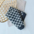 Children's knitted scarf featuring a classic grey and blue checkered pattern - Plaid Grey