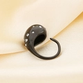 Detail of water drop ring in black finish with white crystals on silk background - Black White Zircon (KR112031-HR)