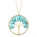 Detail of tree of life pendant with handmade gold wire wrap and turquoise crystal stones - Gold + Turquoise
