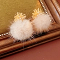Close-up of golden earrings with zircon top and large light pink fluffy fur balls - Coffee (Silver Earring Post)
