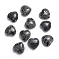 Polished 20mm heart-shaped labradorite natural gemstones scattered on white background - Flash Stone