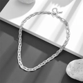 Collana a tre strati di catena a serpente intrecciata in argento su sfondo moderno - Collana Argento (D301)