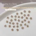Mini ciondoli floreali per nail art color champagne con base in metallo scintillante - Champagne (1 pezzo)