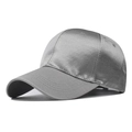 Detail of grey satin baseball cap showing glossy fabric texture and six-panel stitching - Adjustable / Gray
