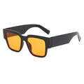 Rectangle sunglasses with thick black frames and transparent orange lenses in a side view - Black Frame Orange Lens