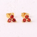Minimalist gold stud earrings featuring three round red zircons in a triangle setting - Red