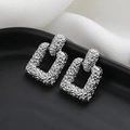 Minimalist silver rectangular earrings with hammered metal texture on black base - Irregular Texture Earrings / Silver