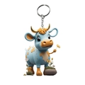 Blauwe cartoon hooglandkoe sleutelhanger met gouden hoorns op een witte achtergrond - Lichtblauw Geel Gevlekt Stijl