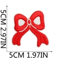 Detail view of 5x5cm red embroidered bow patch with white stitched edges for clothing - Red Bow Knot (11)