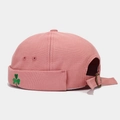 Close-up of pink cotton miki hat featuring green clover embroidery and adjustable strap - Adjustable / Dusty Pink