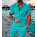 Detail of teal men's polo set featuring geometric jacquard knit texture on fabric - Lake Blue
