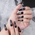 Long black coffin press-on nails with pink baby lettering design on model hands - CBLCY-K04 Black Pink Baby Design