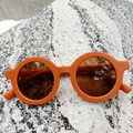 Fashionable round frame kids sunglasses in matte orange finish for boys and girls - Orange