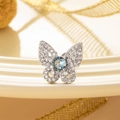 Elegant silver butterfly stud earring with blue gemstone and sparkling crystals - Ice Blue