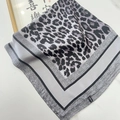 Black and white leopard print square scarf in silk-like polyester on marble background - Leopard Print Grey