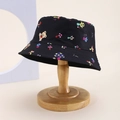 Detailed view of black kids bucket hat with colorful mushroom and teddy bear prints - Kids One Size / Black (Love/Teddy Bear)