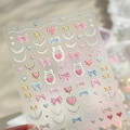 Stickers nail art 3D nœuds et cœurs M-1227 avec texture gaufrée dorée - 5D Relief Marquage à Chaud Or Nœud Cœur (M-1227)