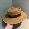 Close-up of natural straw weave texture and dark brown ribbon on a sun hat - 55-58cm Adjustable / Yellow with Coffee Ribbon