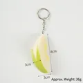 Realistic green mango slice keychain with metal ring and 36g weight details - Keychain / Cyan