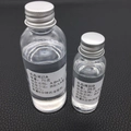 DIY crystal epoxy AB resin kit with 75g A and 25g B bottles on a dark leather background - 100g AB Resin Set (75g+25g)