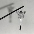Macro detail of wooden hair pin with calligraphic butterfly pendant and bead - 1# Hair Stick - Black Butterfly Calligraphy