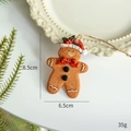 Gingerbread man resin Christmas ornament with red hat and 8.5cm height dimension - Red Berry Gingerbread Man