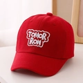 Close-up of TOMORROW embroidery on red cotton baseball cap with six-panel structure - 52cm (2-5 Years) / Red