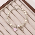 Collar Y2K plateado con dije de corazón rosa y lazo plateado en forro de terciopelo - Pulsera Lazo Corazón Plata (S02)