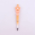Close-up of a creative DIY beaded pen with an orange silicone daisy flower on top - Peach Red Flower