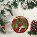 Detailed shot of circular red plaid wooden Christmas ornament with silver glitter reindeer - Red And Black Plaid Reindeer